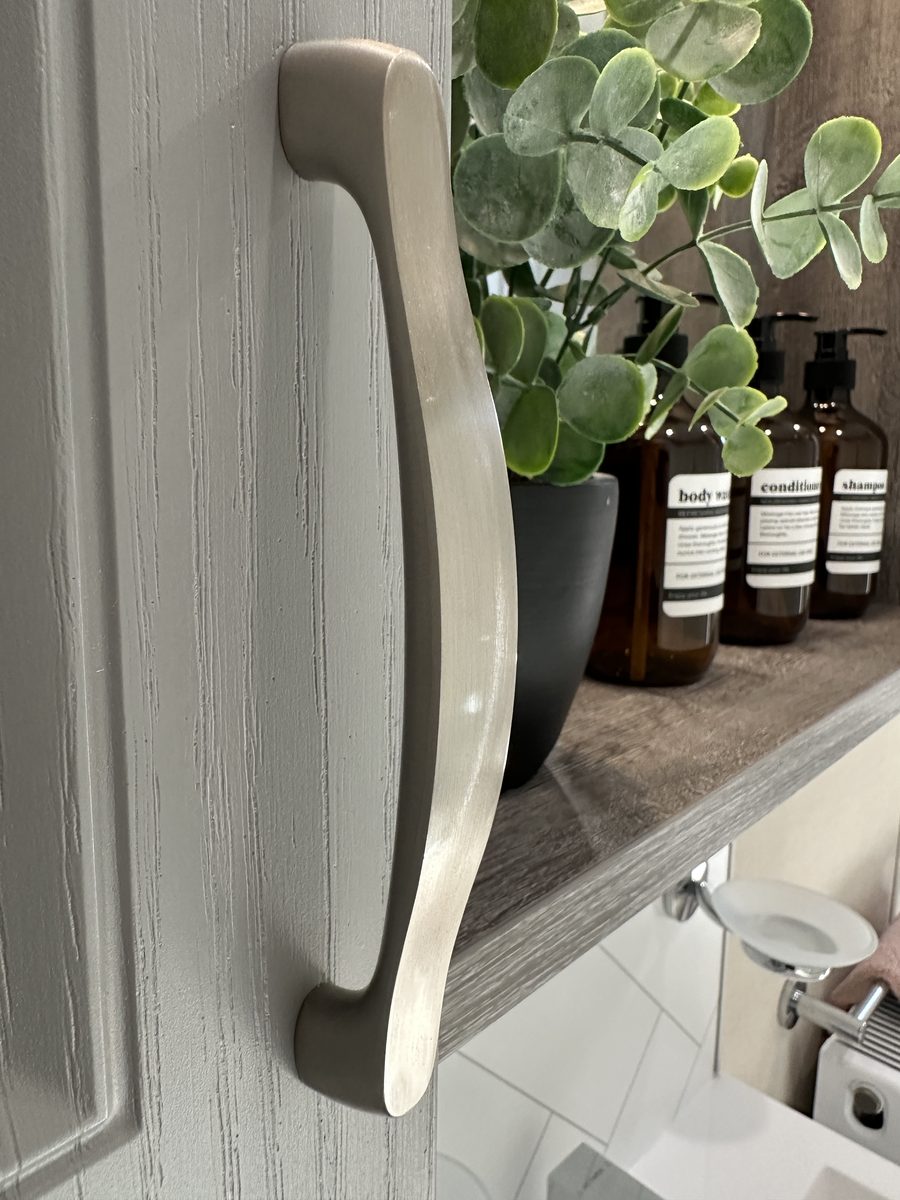 The Glendale, a brushed handle on a panelled door