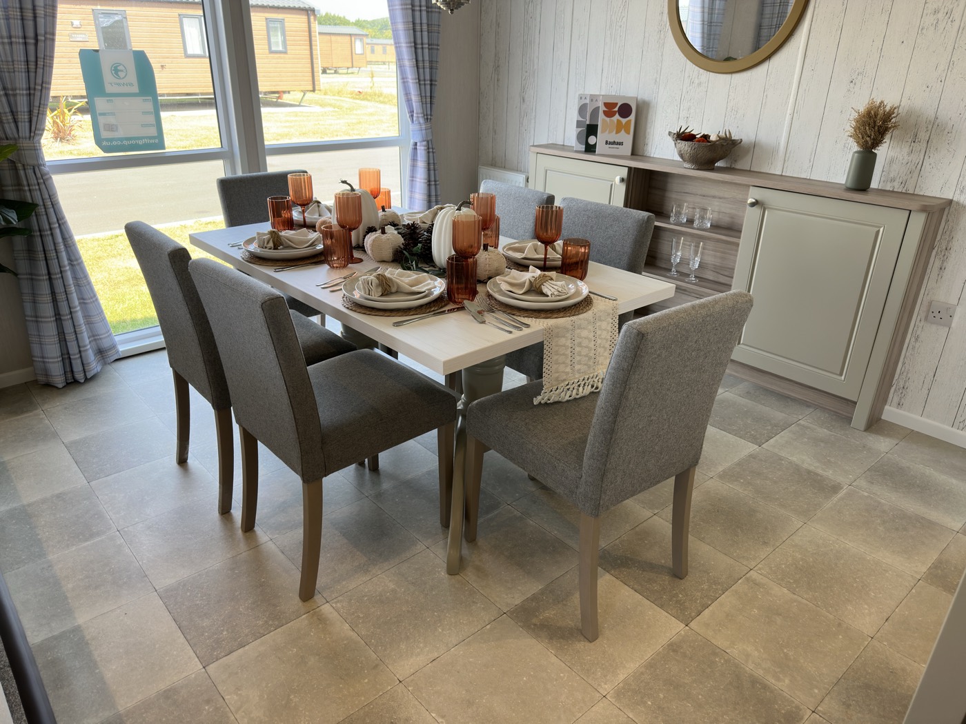 The dining area of a lodge at Nottage Park Lodges