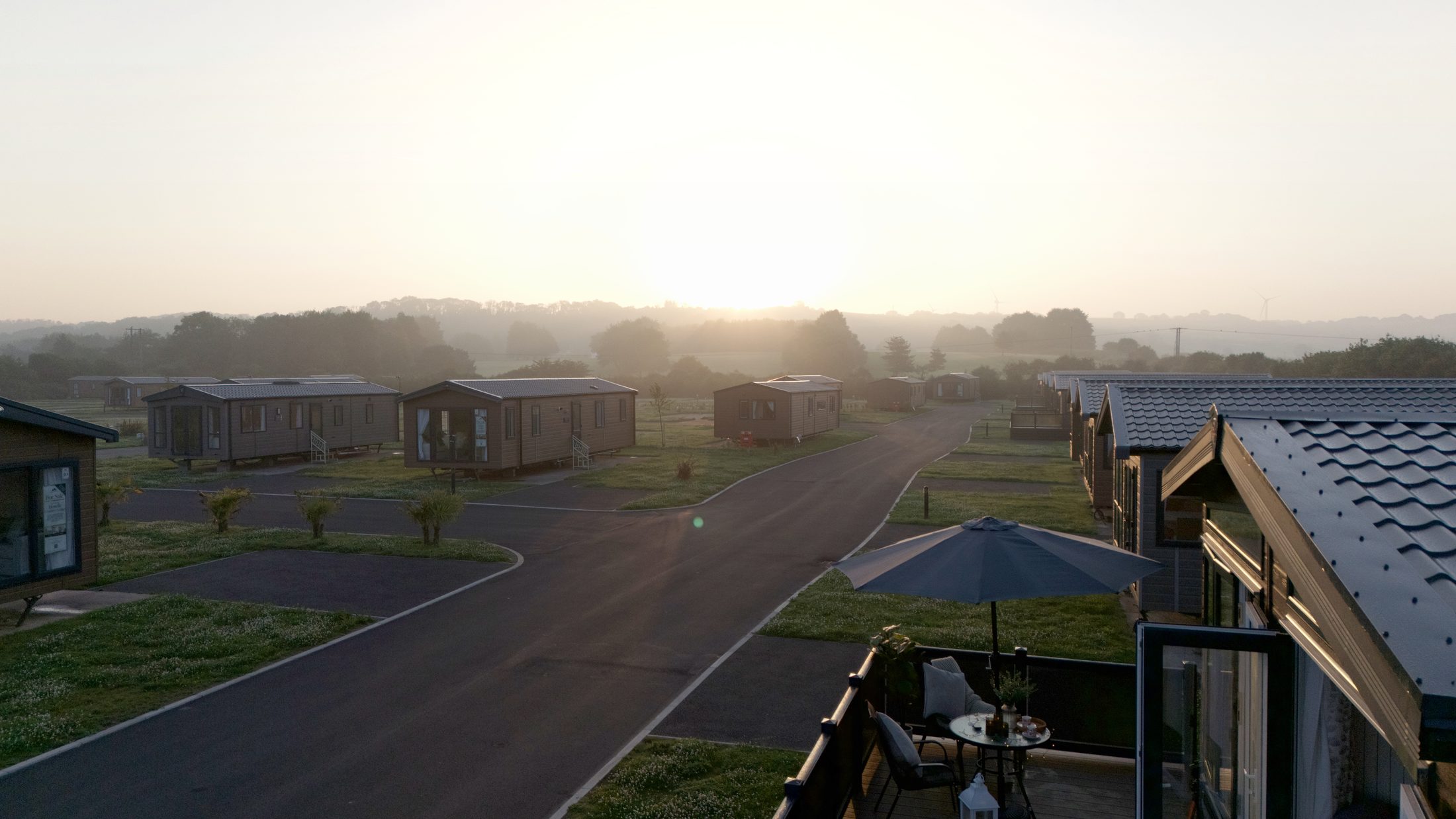 Sunrise over Nottage Park Lodges, looking down the park